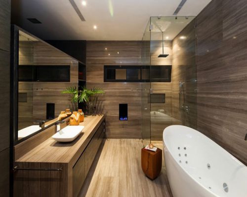 Thiết kế tường gỗ cho nhà tắm tone màu ấm áp tạo cảm giác thư giãn thoải mái - chính xác những gì bạn muốn khi đi đến spa.