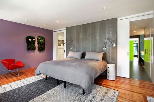Mẫu 5: Nhẹ nhàng với tone màu tím mộng mơ, kết hợp 1 bức tường bê tông khiến căn phòng vừa nhẹ nhàng vừa cá tính.